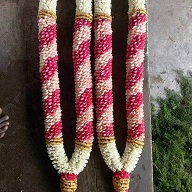 2 garlands with light pink flowers and beads