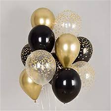 Clear and gold and black balloons on the sticks