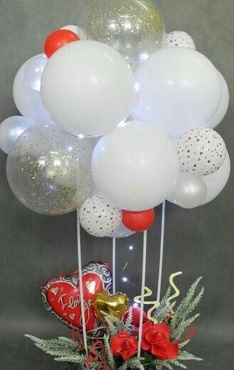 Group of 18 White with one clear and 2 red balloons tied to a basket with red roses and red valentine heart