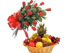 2 kg. fruits with 12 roses in a hand bouquet