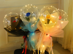 Four Transparent bobo balloons with roses inside and LED Light for Birthday