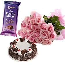 12 pink roses 1/2 kg black forest cake 1 silk chocolate